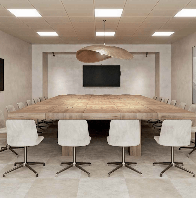 Professional meeting room with large conference table and presentation screen