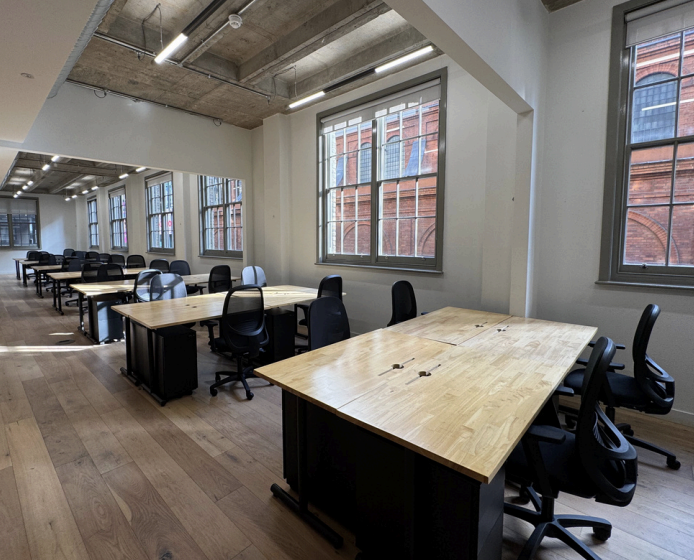 365 Finance open workspace with desks
