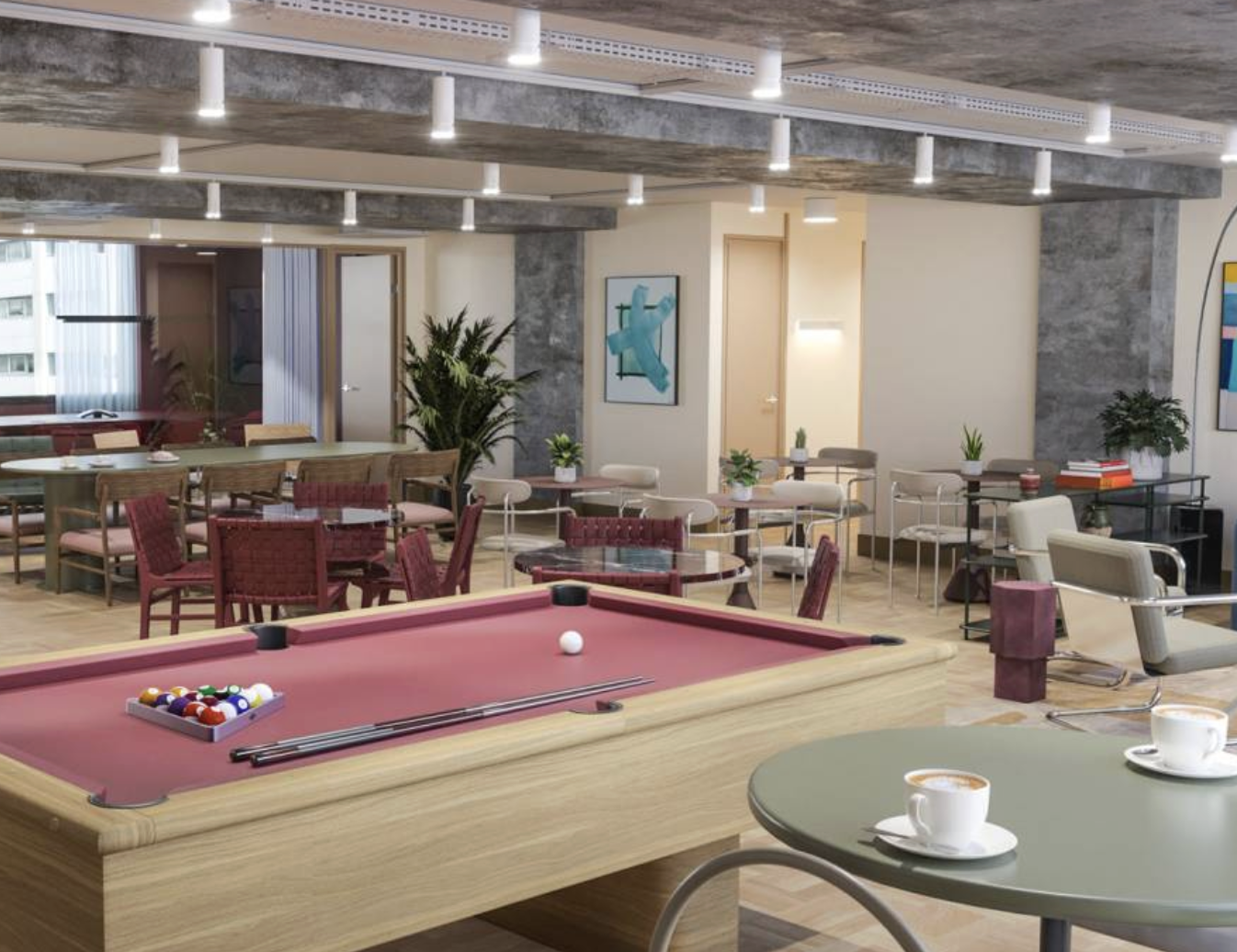 SCIRIS breakout lounge with pool table and seating area